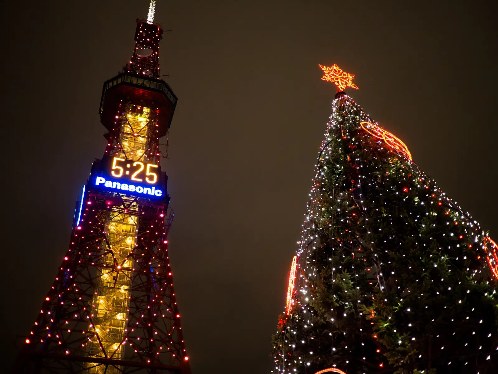 Sapporo TV Tower and a lit Christmas tree during the Sapporo White Illumination.